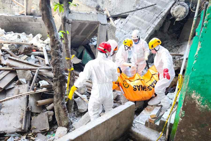 At least 50 bodies recovered after Indonesian school collapse, 13 remain missing