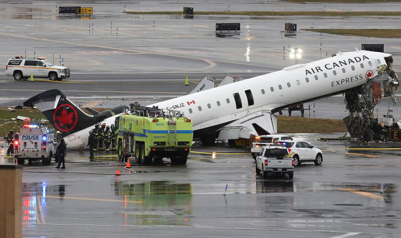 Pilot and co-pilot killed in collision between aircraft and emergency vehicle at a New York airport