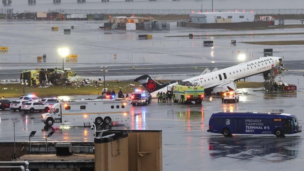 Two pilots dead in runway collision at New York airport