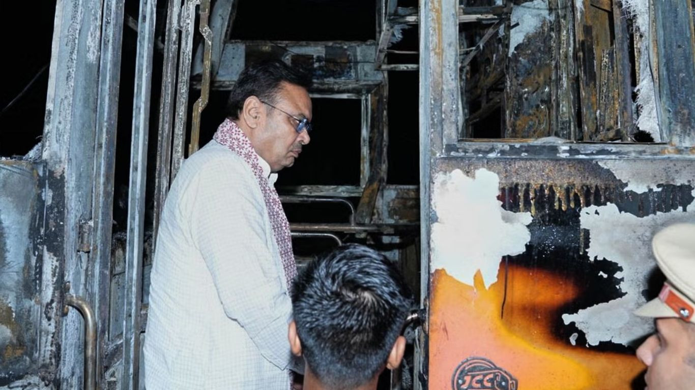 A passenger bus in northern India catches fire and burns at least 20 people to death