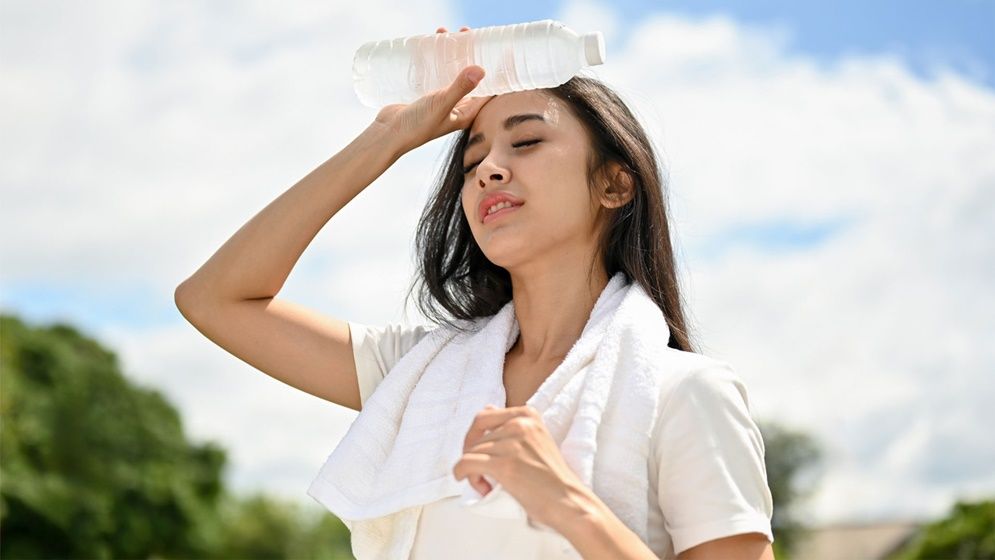Why do I get dizzy when I go out in the sun in summer? What can I do to keep my body cool?