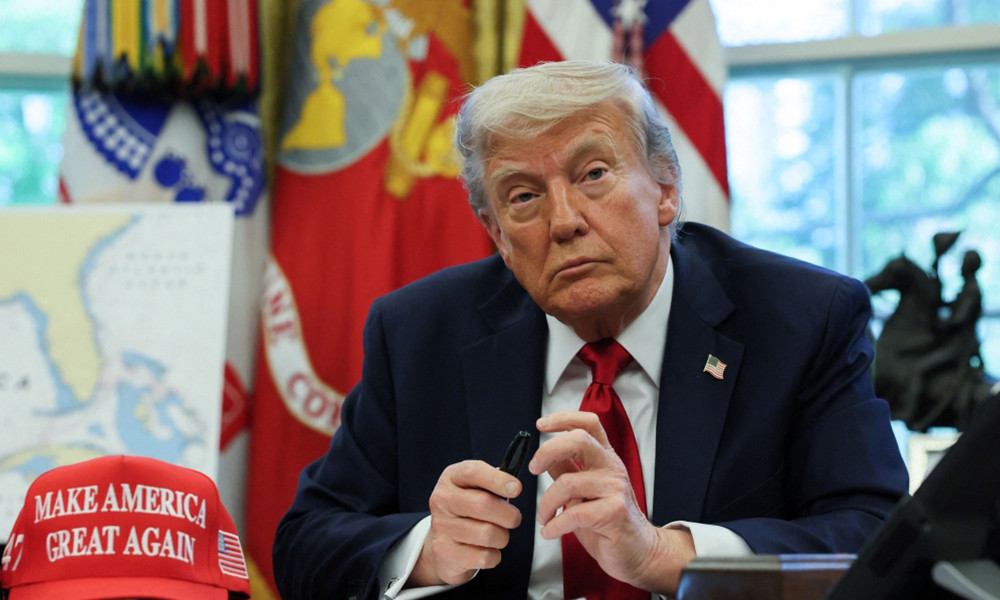 Trump says he will visit China ‘early next year’