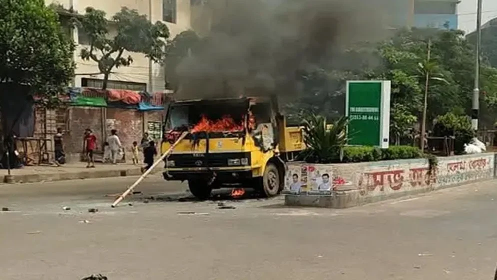 Clashes during sidewalk eviction drive in Mirpur; three vehicles set on fire.