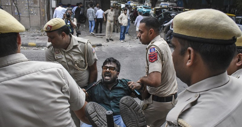 12 journalists detained during protests in Delhi.