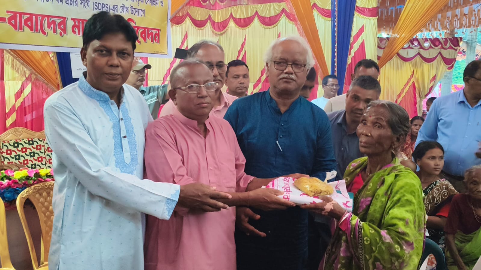 Distribution of clothing among followers of the Sanatan faith in Ruhiya