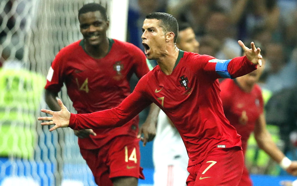 Ronaldo hat-trick earns Portugal draw with Spain