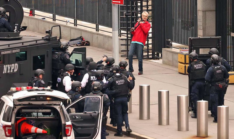 Security is tight in movement of armed man front of UN