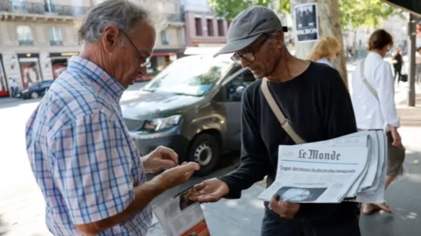France's last newspaper hawker to receive national honour from President Macron