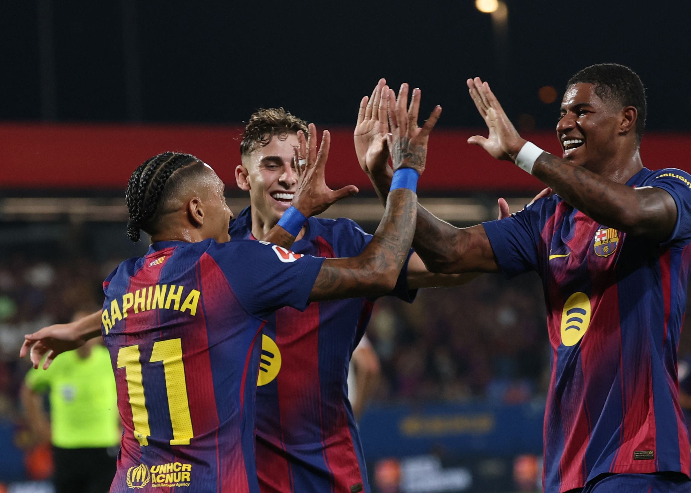 Champions Barca crush Valencia at training ground stadium
