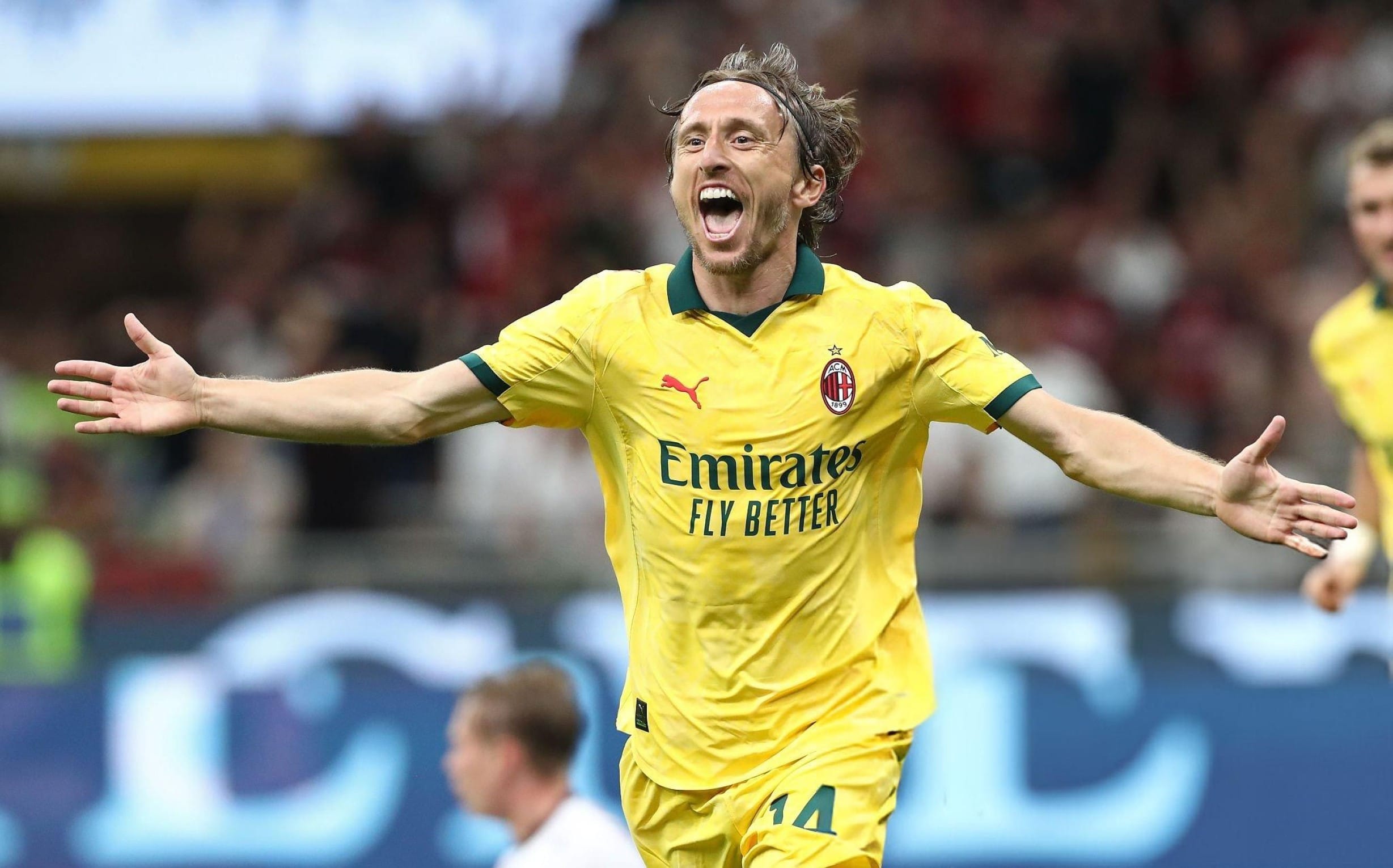 Timeless Modric opens AC Milan account with winner against Bologna