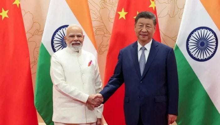 China, India pledge to be ‘partners not rivals’