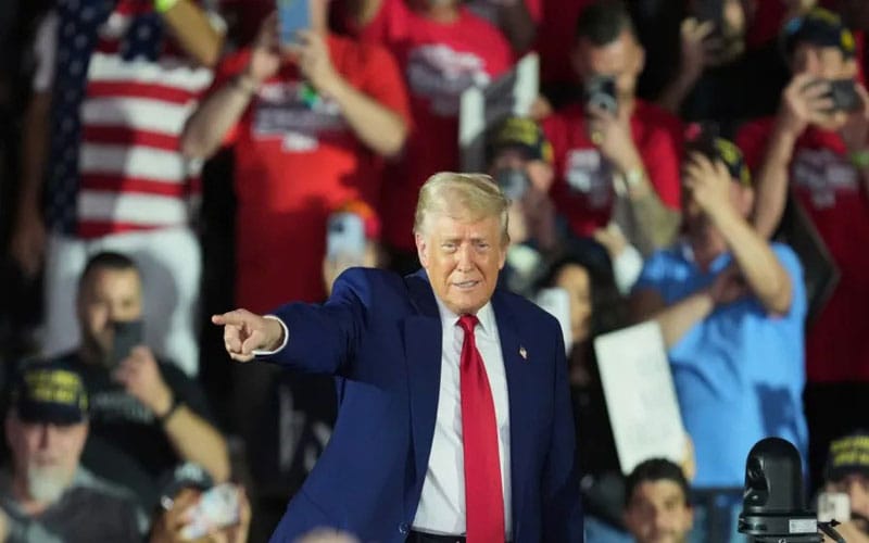 Trump lashes out at Biden and judges at Michigan rally