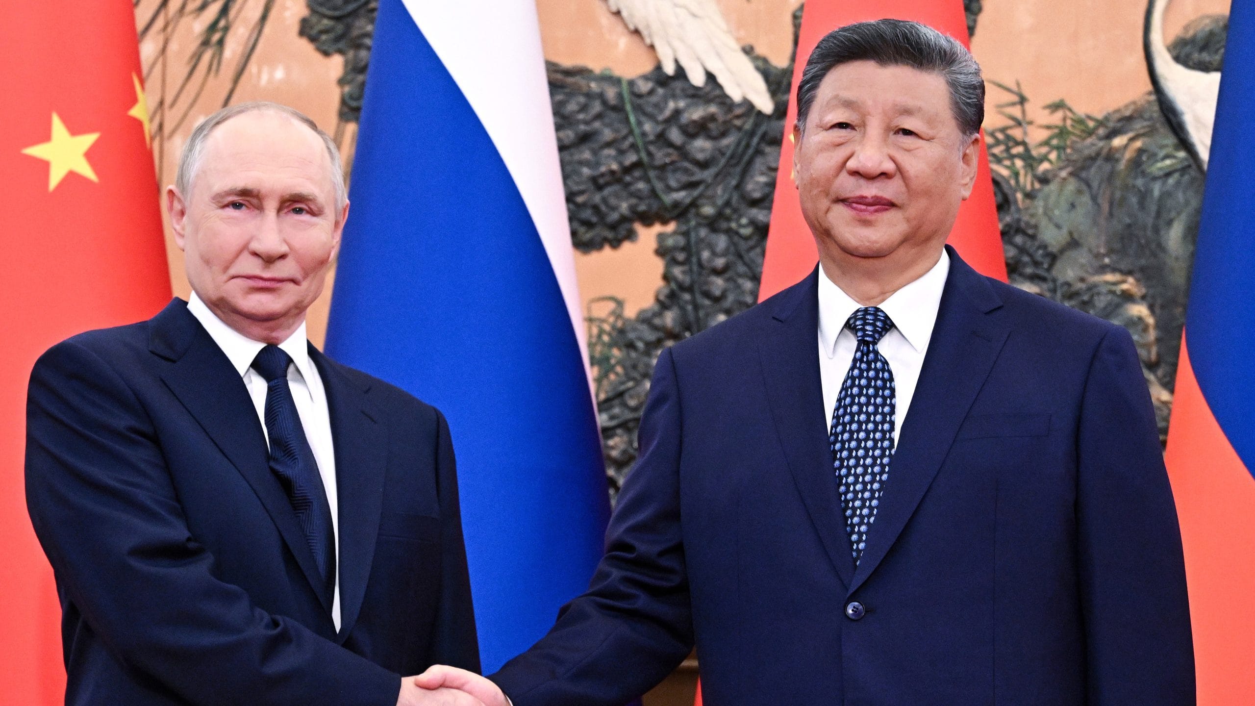 Xi, Putin reaffirm ‘old friend’ ties in face of US challenges
