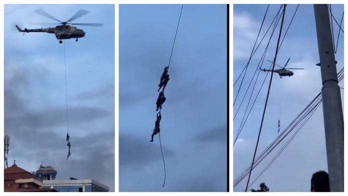 Nepal ministers, family cling to chopper rope to flee protests